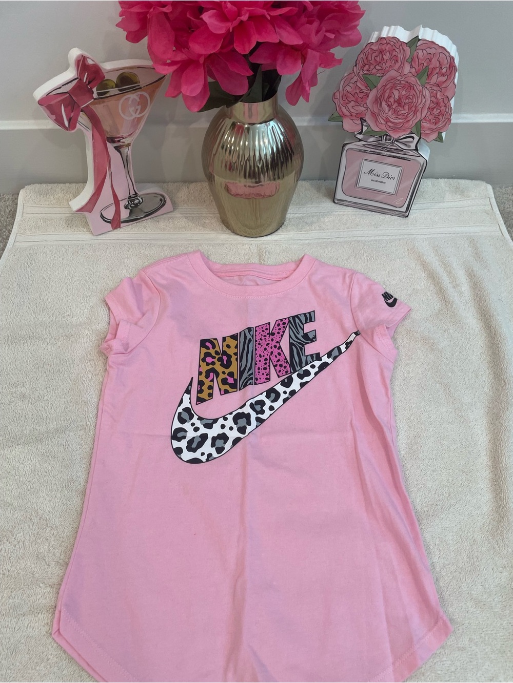Nike Pink Girls' Short Sleeve Graphic Tee with Animal Print Logo